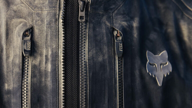 Man holding a V3RS helmet