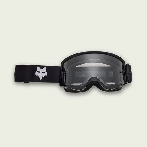 Black goggles on green background